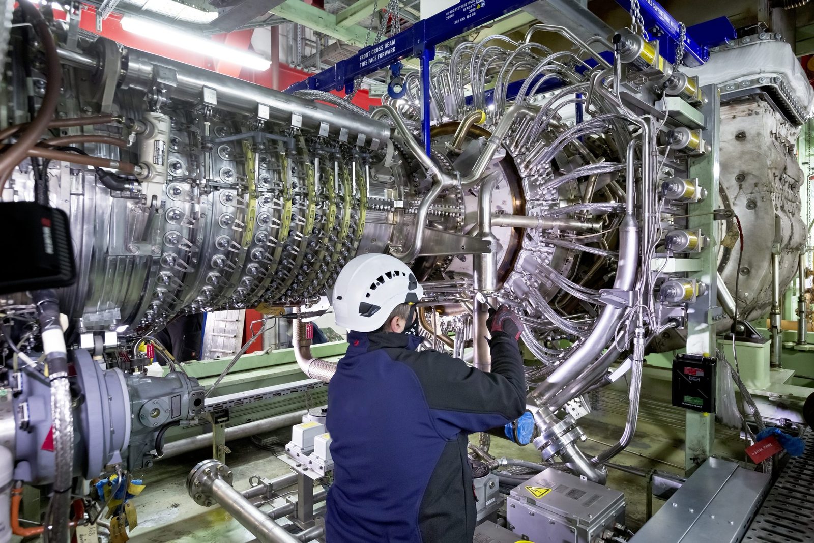 Remco Petersen working on the compressor section of an aero-derivative gas turbine